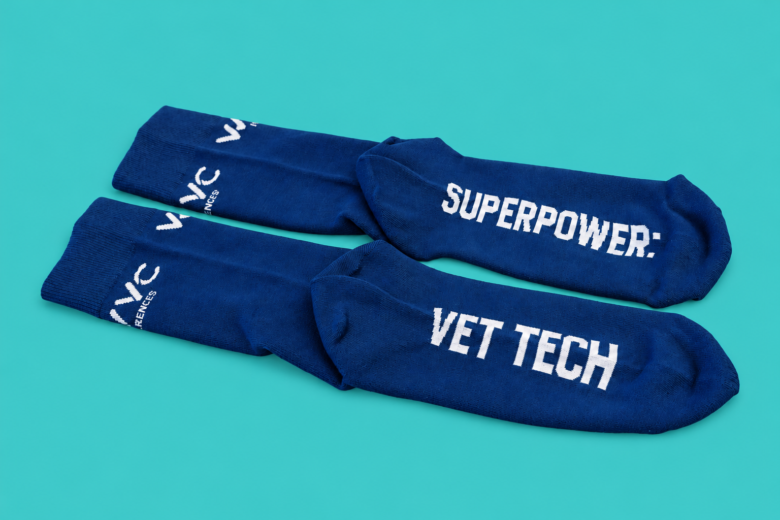 Navy WVC socks reading Superpower: Vet Tech